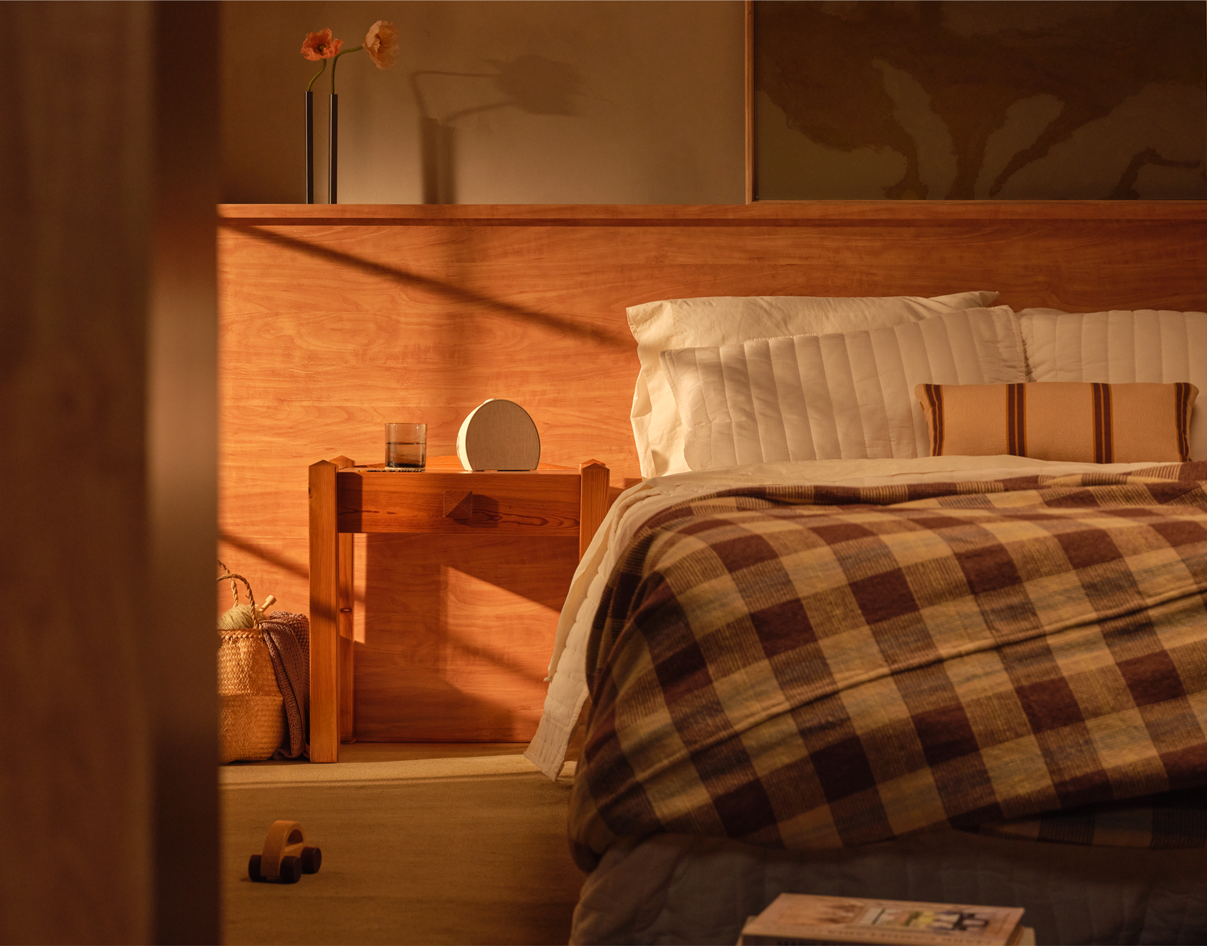 Real-world shot on a nightstand in a sunset-lit bedroom
