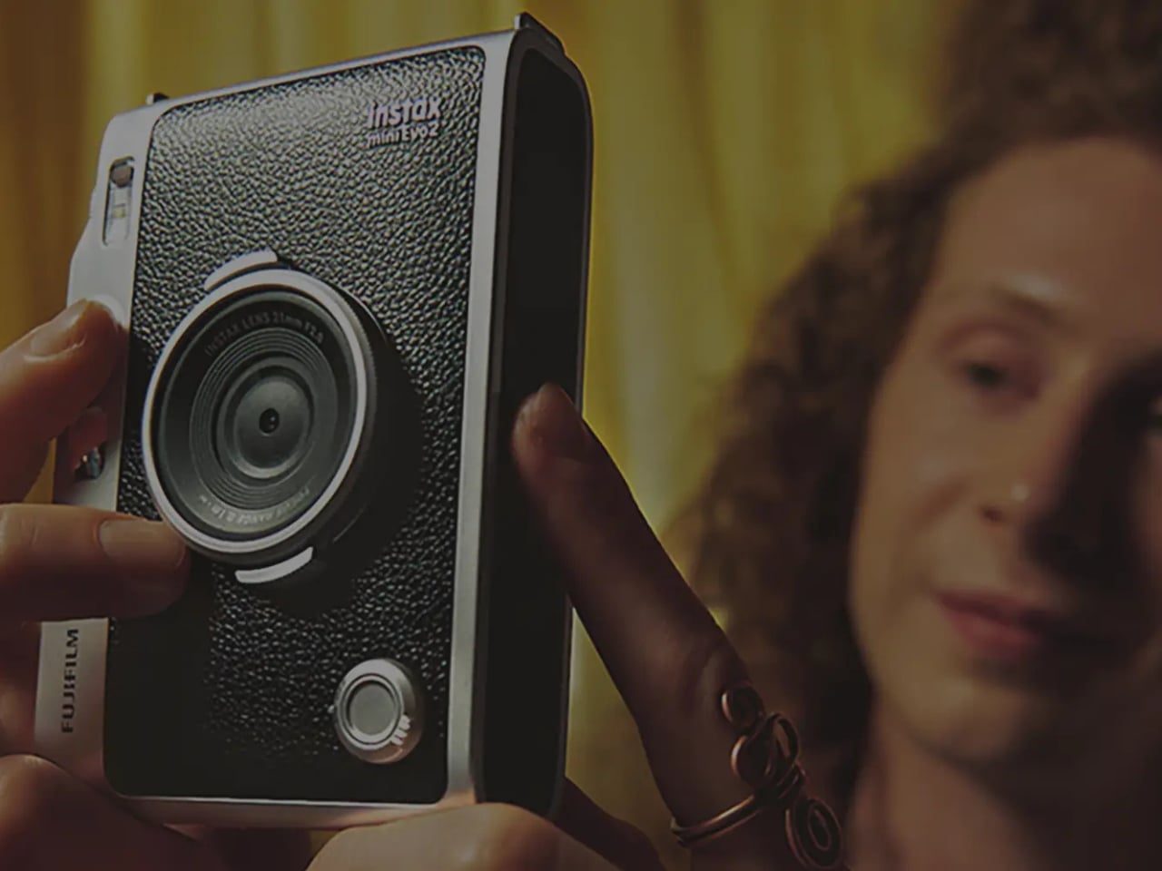 Instax Mini Evo 2 held in hand